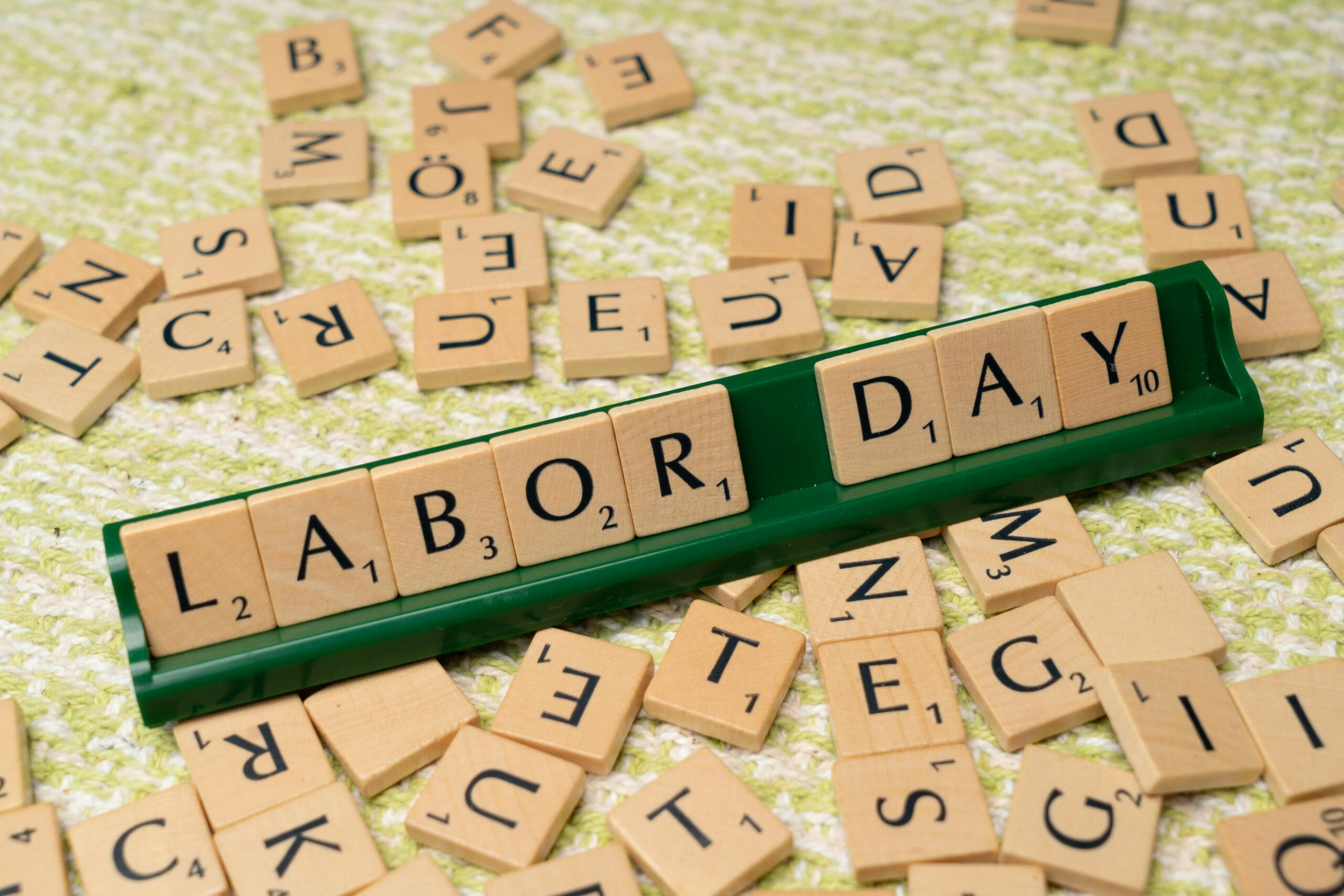 Labor Day spelled out in Scrabble tiles